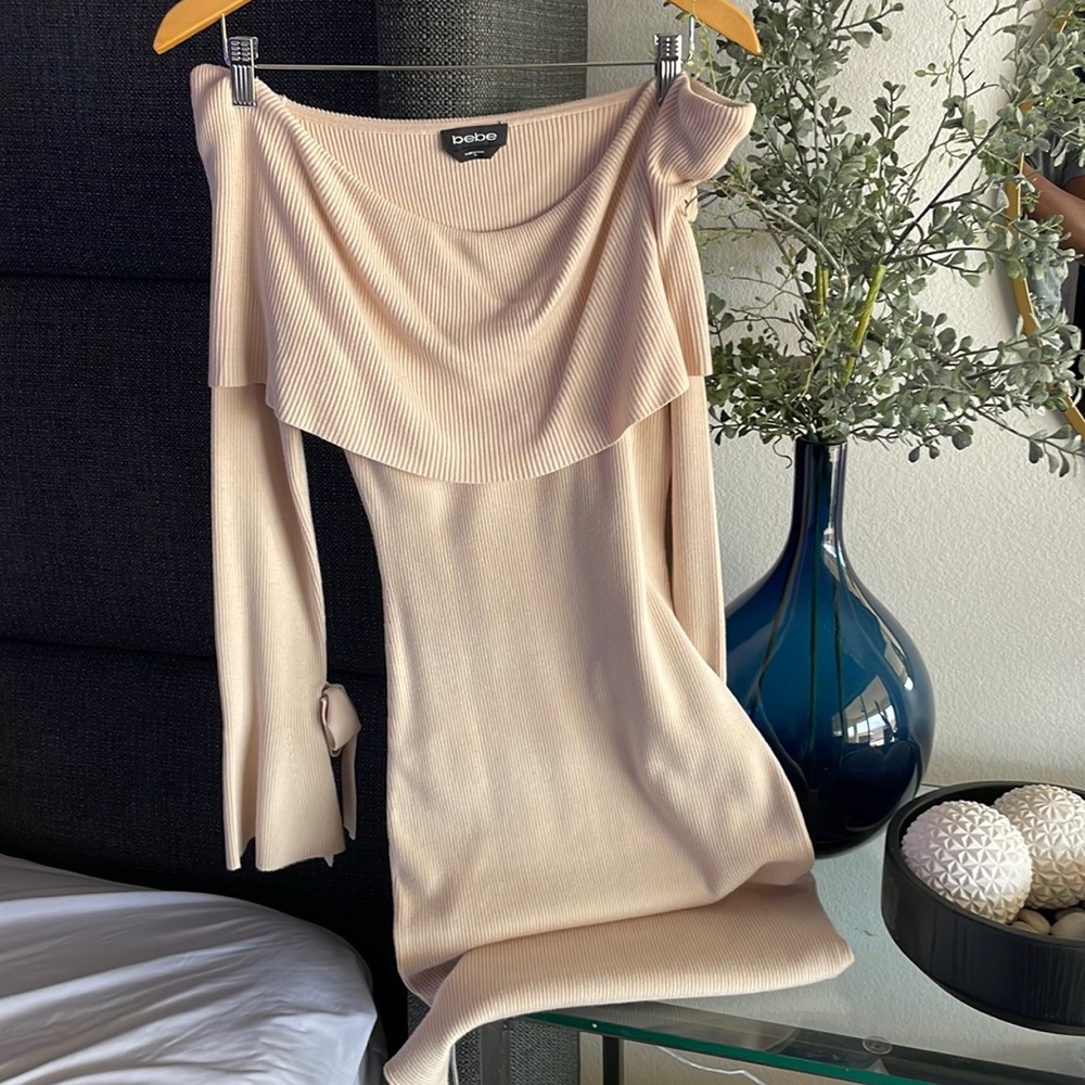 Cream colored off the shoulder sweater dress. midi length.